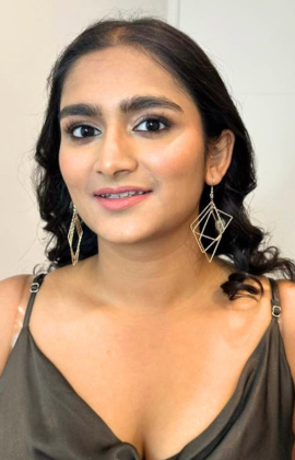 Effortlessly stunning makeup and dreamy curls by Blush and Brushh in Minee, capturing timeless elegance.