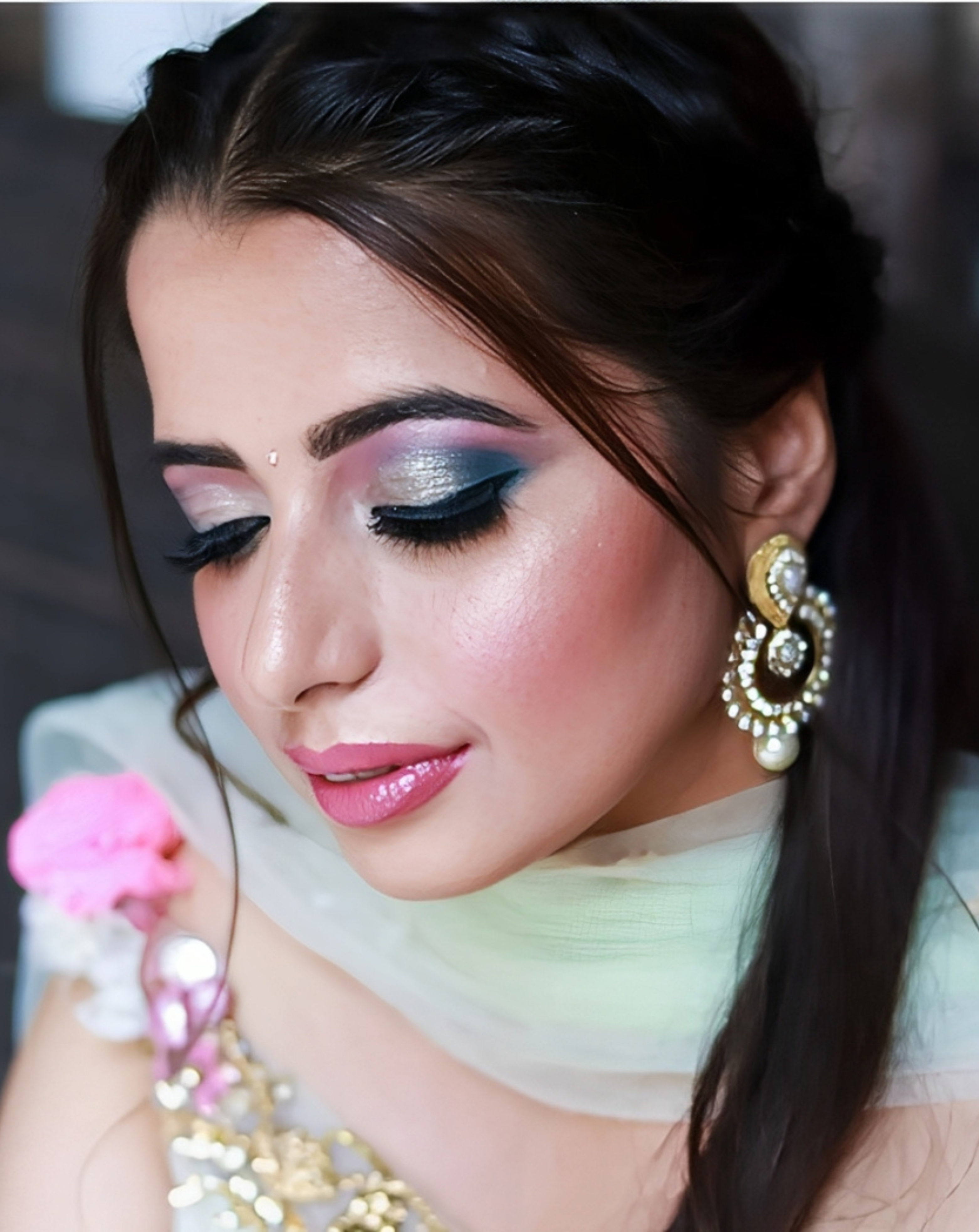 Vibrant pink and blue eye makeup by Blush and Brush by Minee in Perth, designed to create a bold, stunning look for any special occasion.