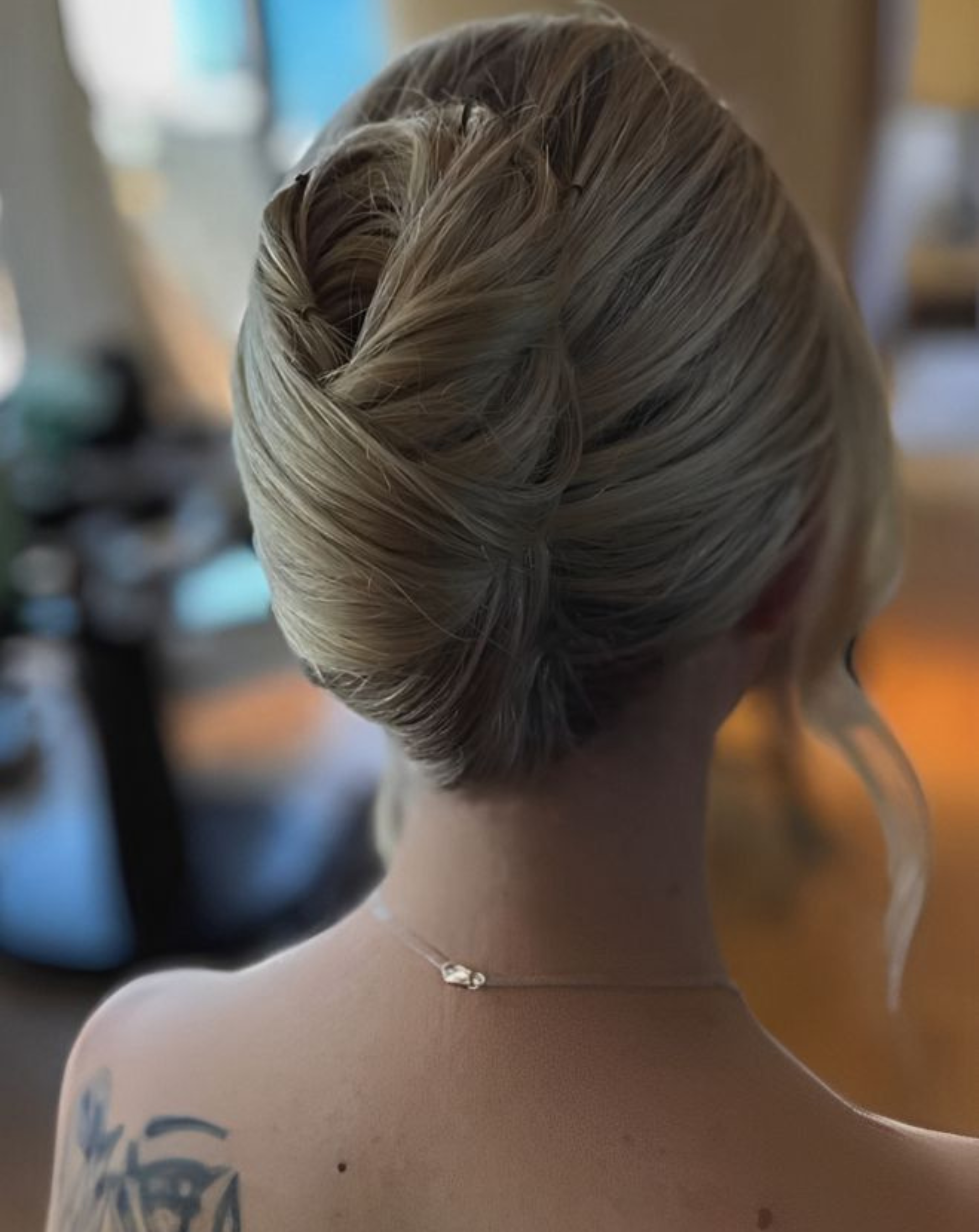 Elegant bun hairstyle in Perth by Blush and Brush by Minee, perfect for weddings, events, or any special occasion, creating a sleek and sophisticated look. Elegant bun hairstyle in Perth by Blush and Brush by Minee, perfect for weddings, events, or any special occasion, creating a sleek and sophisticated look.