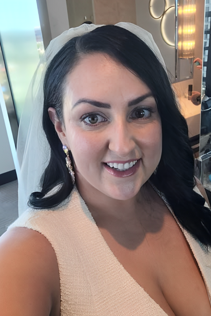 ridal makeup and hairstyle by Blush and Brush by Minee, featuring a flawless, elegant look with soft, romantic curls and radiant makeup, perfect for the big day.