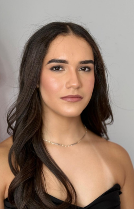 Glamorous makeup and perfectly styled hair by Blush and Brushh in Minee, creating a stunning look.
